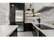 Modern kitchen with stainless steel appliances, sleek countertops, and ample storage space at 13429 Fountainbleau Dr # 13429, Clermont, FL 34711