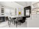 Contemporary kitchen featuring a center island with seating, modern appliances and ample cabinet space at 13429 Fountainbleau Dr # 13429, Clermont, FL 34711