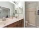 Bright bathroom with double vanity and glass enclosed shower at 1530 Tally Cir, Oviedo, FL 32765
