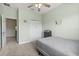 A bright bedroom featuring a ceiling fan, closet and neutral decor at 1530 Tally Cir, Oviedo, FL 32765