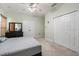Relaxing bedroom featuring a ceiling fan, window, and closet at 1530 Tally Cir, Oviedo, FL 32765