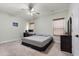 Comfortable bedroom with ample natural light, and neutral color palette at 1530 Tally Cir, Oviedo, FL 32765