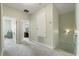 A hallway featuring multiple rooms and a stairwell at 1530 Tally Cir, Oviedo, FL 32765