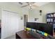A Home Office featuring two monitors, a keyboard and a ceiling fan at 1530 Tally Cir, Oviedo, FL 32765