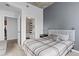 Modern bedroom with ensuite bathroom and neutral tones at 155 S Court Ave # 1202, Orlando, FL 32801