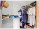 Walk-in closet featuring wire shelving and various clothing storage solutions at 155 S Court Ave # 1202, Orlando, FL 32801