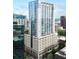 Contemporary high-rise condo building showcasing modern architecture and glass facade at 155 S Court Ave # 1202, Orlando, FL 32801