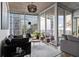 Sleek living room featuring floor-to-ceiling windows and modern decor at 155 S Court Ave # 1202, Orlando, FL 32801