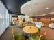 Community lounge with comfortable seating, tables, and a well-designed layout at 155 S Court Ave # 1202, Orlando, FL 32801