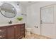 Modern bathroom featuring stylish vanity, wood-look flooring, and modern fixtures at 157 Long Pine Dr, Deltona, FL 32725