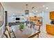 Open concept living area with a dining area, kitchen, and living room perfect for Gathering time at 157 Long Pine Dr, Deltona, FL 32725