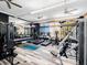 Well-equipped gym with treadmills, weights, and mirror, perfect for a complete workout at 200 Valencia Ridge Dr, Auburndale, FL 33823