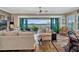 Cozy living room with water views, comfortable seating and stylish decor at 200 Valencia Ridge Dr, Auburndale, FL 33823