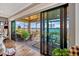 Expansive screened patio with outdoor seating, offering scenic water views at 200 Valencia Ridge Dr, Auburndale, FL 33823