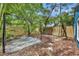 Backyard showcasing a gazebo, concrete pad and stone paver walkway at 2004 E Marks St, Orlando, FL 32803