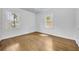 Comfortable bedroom featuring hardwood floors, natural light and neutral-colored walls at 2004 E Marks St, Orlando, FL 32803
