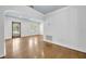 Hardwood floors, white walls, and natural light create a warm and inviting living space at 2004 E Marks St, Orlando, FL 32803