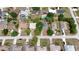 Aerial view of the neighborhood showcasing houses, streets, and pools at 2025 Claremont Dr, Deltona, FL 32725