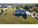 Expansive lot featuring a beautiful home, mature trees, and lush landscaping on a sprawling estate at 20951 County Road 561, Clermont, FL 34715