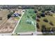 Expansive estate property featuring a well-maintained home, lush greenery, and spacious land at 20951 County Road 561, Clermont, FL 34715