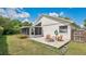 Charming backyard with a cozy fire pit area for relaxation and outdoor enjoyment at 2381 Pinebrook Ct, Oviedo, FL 32766