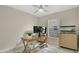 Inviting home office with natural light, modern desk, and storage at 2381 Pinebrook Ct, Oviedo, FL 32766