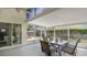 Spacious screened lanai with an outdoor dining set, perfect for entertaining and relaxing outdoors at 2381 Pinebrook Ct, Oviedo, FL 32766