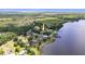 Serene lakefront community boasting picturesque homes with direct access to the tranquil waters at 2519 Gabriel Rd, Fort Meade, FL 33841