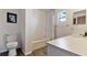 Well-maintained bathroom with shower and tub, neutral color palette, and ample vanity space at 2519 Gabriel Rd, Fort Meade, FL 33841