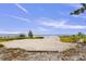 Sandy beach area overlooking serene lake, complete with a private dock at 2519 Gabriel Rd, Fort Meade, FL 33841