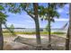 Relaxing hammock view with waterfront dock and scenic backdrop at 2519 Gabriel Rd, Fort Meade, FL 33841