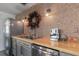 A charming kitchen nook featuring stainless steel appliances and a view-enhancing decorative wreath at 2519 Gabriel Rd, Fort Meade, FL 33841
