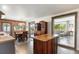 A well-lit, open kitchen with brick accents, a dining area, and seamless transition to the living room at 2519 Gabriel Rd, Fort Meade, FL 33841