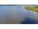 Expansive lake view showcases tranquil, shimmering waters and verdant shoreline at 2519 Gabriel Rd, Fort Meade, FL 33841