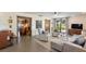 Bright living room with comfortable seating, ceiling fan and elegant decor at 2519 Gabriel Rd, Fort Meade, FL 33841