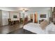Bright main bedroom boasts wood floors, ceiling fan, and classic furniture at 2519 Gabriel Rd, Fort Meade, FL 33841