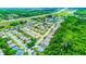 Scenic aerial view of a suburban neighborhood surrounded by trees, offering a peaceful setting at 2626 Greenwillow Dr, Orlando, FL 32825