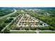 Aerial view of a residential neighborhood with well-maintained homes and mature trees at 2626 Greenwillow Dr, Orlando, FL 32825