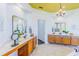 Bright bathroom features double sinks, beautiful chandeliers, and great natural light at 2626 Greenwillow Dr, Orlando, FL 32825