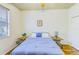 Bright bedroom featuring wood-look flooring, ceiling fan and comfortable furniture in a serene setting at 2626 Greenwillow Dr, Orlando, FL 32825