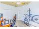 Versatile bedroom with wood floors, a workstation, and a bicycle rack, offering flexible space at 2626 Greenwillow Dr, Orlando, FL 32825