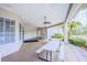 The clubhouse patio provides an open air space with picnic tables, ceiling fans, and shade at 2626 Greenwillow Dr, Orlando, FL 32825