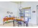 Inviting dining area showcases a wooden table set, decorative chandelier, and natural light at 2626 Greenwillow Dr, Orlando, FL 32825