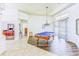 Spacious game room with a pool table and lots of natural light at 2626 Greenwillow Dr, Orlando, FL 32825