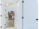 A cozy office featuring a desk, rolling chair, and wood floors at 2626 Greenwillow Dr, Orlando, FL 32825