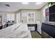 Community kitchenette features a marble-look countertop, white cabinets, and essential appliances at 2626 Greenwillow Dr, Orlando, FL 32825