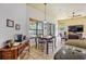 Bright open plan living room and dining area with seamless entertaining and lots of natural light at 2626 Greenwillow Dr, Orlando, FL 32825