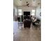 Spacious living room features tile floors, ceiling fan, and comfortable seating arrangement at 2626 Greenwillow Dr, Orlando, FL 32825