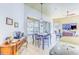 Open concept living spaces featuring views from the kitchen island to the dining and living areas at 2626 Greenwillow Dr, Orlando, FL 32825