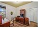 Office featuring built-in wood cabinets and a desk for a functional workspace at 2626 Greenwillow Dr, Orlando, FL 32825